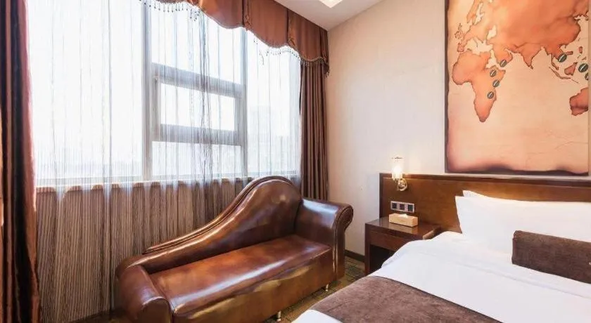 Bed in James Joyce Coffetel· Tianjin Olympic Center Lingbin Road Metro Station