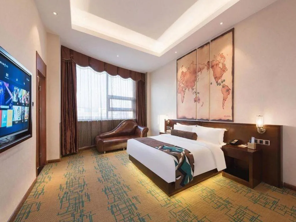 Bed in James Joyce Coffetel· Tianjin Olympic Center Lingbin Road Metro Station