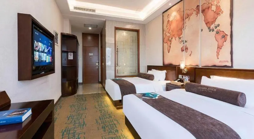 Bed in James Joyce Coffetel· Tianjin Olympic Center Lingbin Road Metro Station