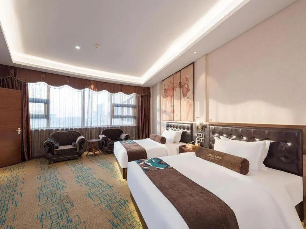 Bed in James Joyce Coffetel· Tianjin Olympic Center Lingbin Road Metro Station