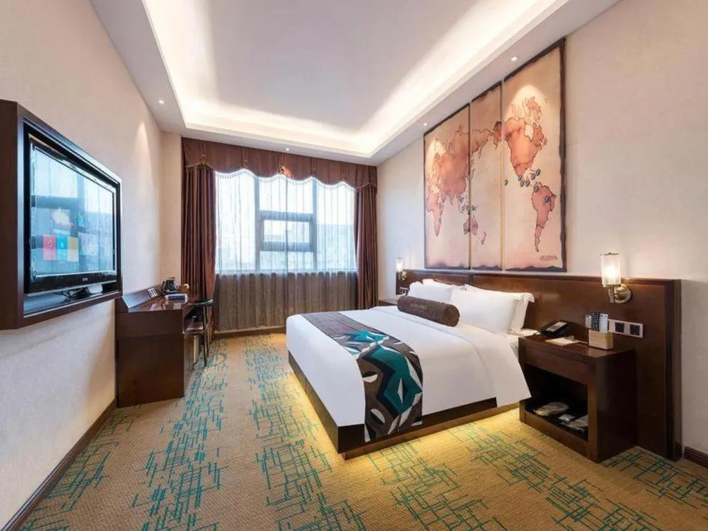 Bed in James Joyce Coffetel· Tianjin Olympic Center Lingbin Road Metro Station