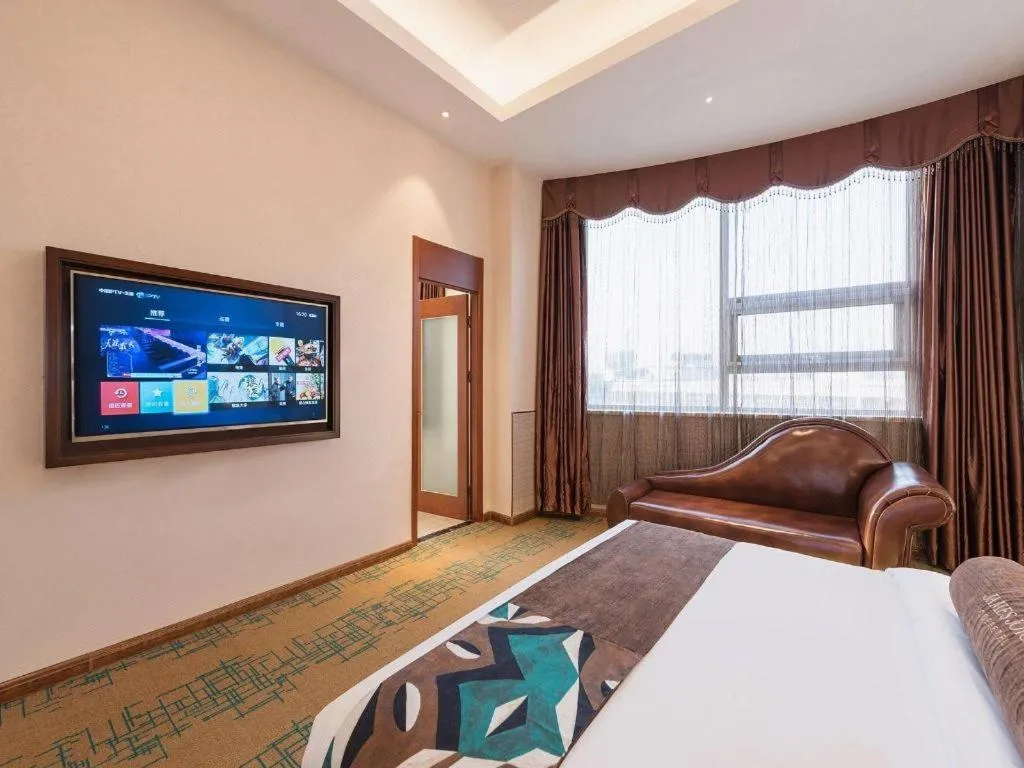 Bed in James Joyce Coffetel· Tianjin Olympic Center Lingbin Road Metro Station