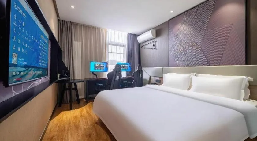 Bed in IU Hotels· Tianjin Houtai Chengjian University Haitai Industrial Park