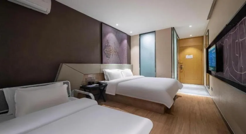 Bed in IU Hotels· Tianjin Houtai Chengjian University Haitai Industrial Park
