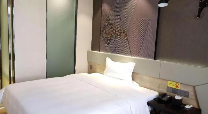 Bed in IU Hotels· Tianjin Houtai Chengjian University Haitai Industrial Park