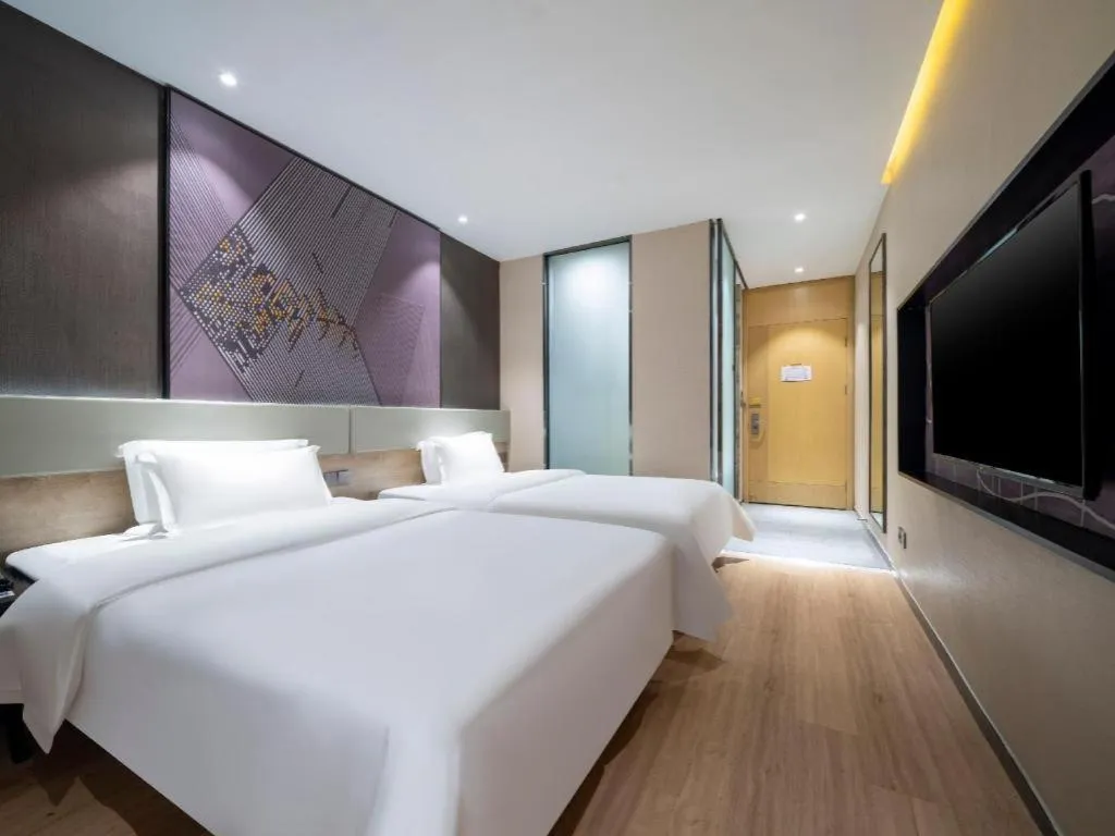 Bed in IU Hotels· Tianjin Houtai Chengjian University Haitai Industrial Park