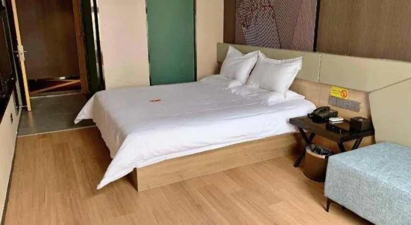 Bed in IU Hotels· Tianjin Houtai Chengjian University Haitai Industrial Park