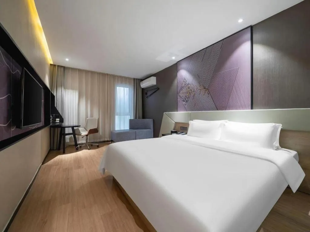 Bed in IU Hotels· Tianjin Houtai Chengjian University Haitai Industrial Park