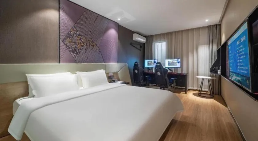 Bed in IU Hotels· Tianjin Houtai Chengjian University Haitai Industrial Park