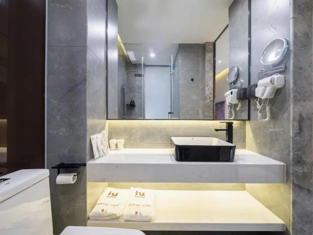 Bed in IU Hotels· Tianjin Houtai Chengjian University Haitai Industrial Park