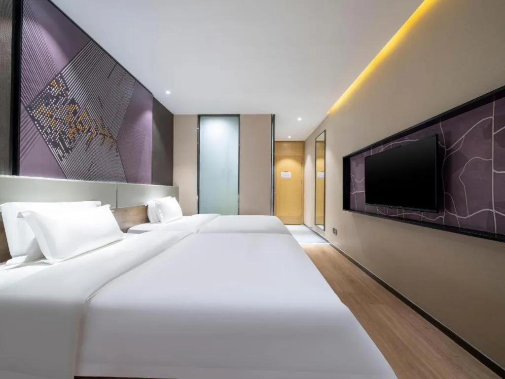 Bed in IU Hotels· Tianjin Houtai Chengjian University Haitai Industrial Park
