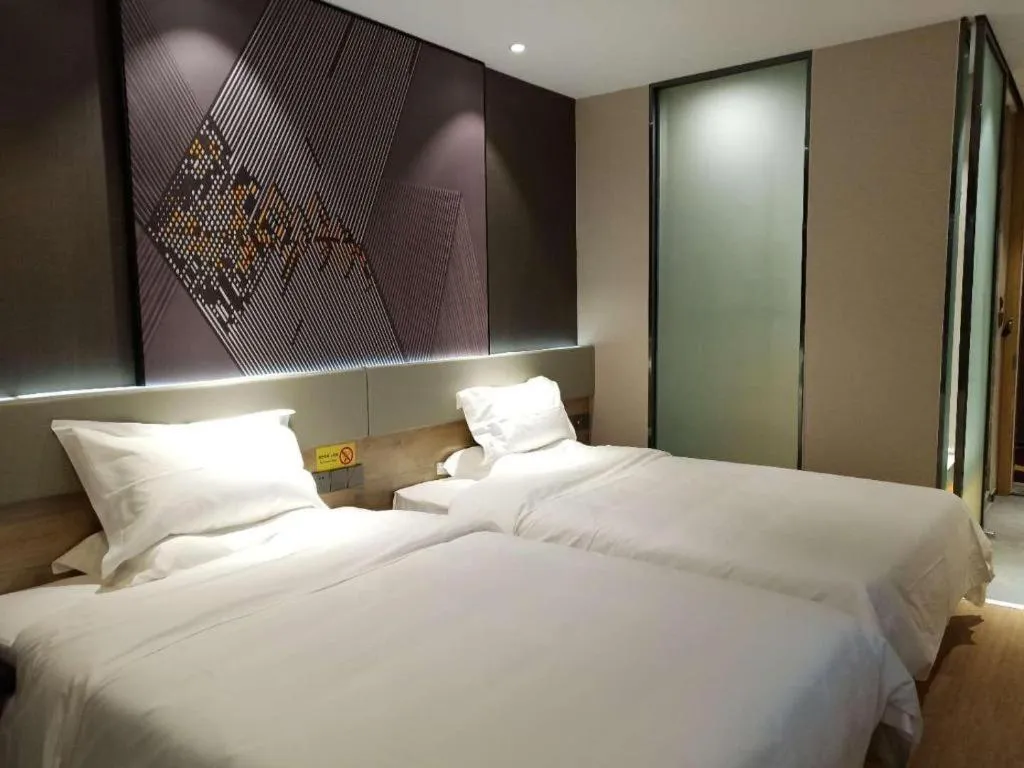Bed in IU Hotels· Tianjin Houtai Chengjian University Haitai Industrial Park