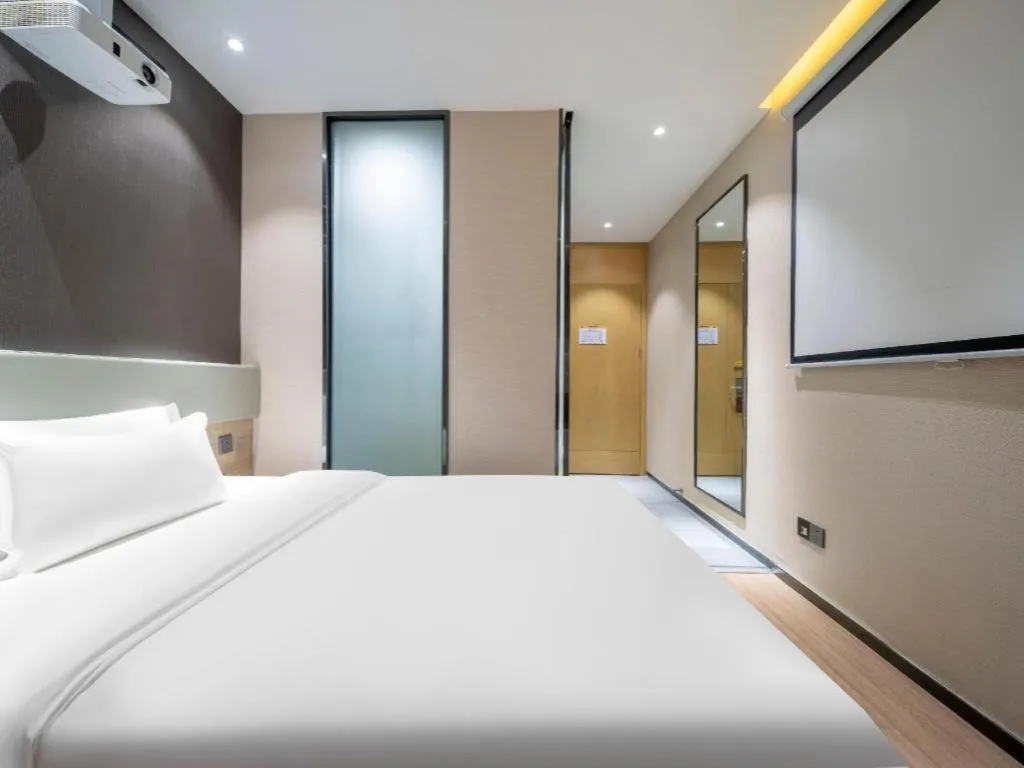 Bed in IU Hotels· Tianjin Houtai Chengjian University Haitai Industrial Park
