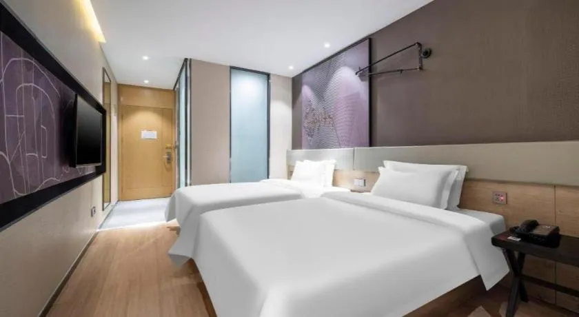 Bed in IU Hotels· Tianjin Houtai Chengjian University Haitai Industrial Park