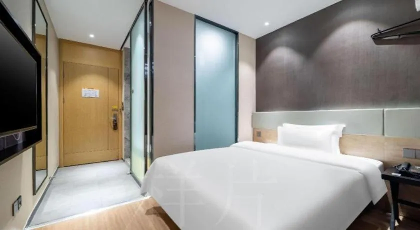 Bed in IU Hotels· Tianjin Houtai Chengjian University Haitai Industrial Park
