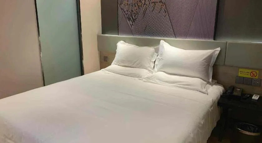Bed in IU Hotels· Tianjin Houtai Chengjian University Haitai Industrial Park