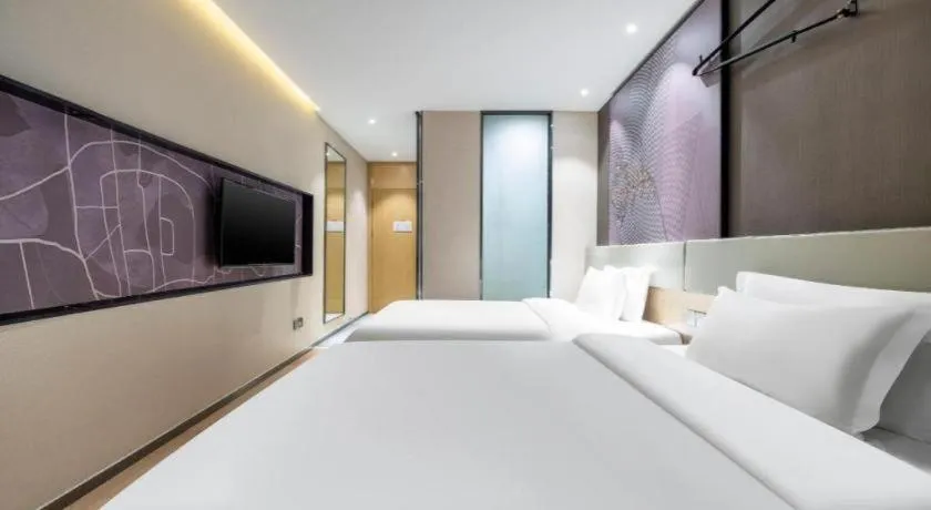 Bed in IU Hotels· Tianjin Houtai Chengjian University Haitai Industrial Park