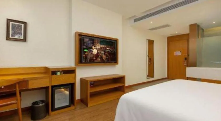 Bed in James Joyce Coffetel Shijiazhuang the Mixc Jinyuan Tower Airport Bus