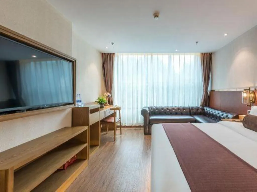 Bed in James Joyce Coffetel Shijiazhuang the Mixc Jinyuan Tower Airport Bus