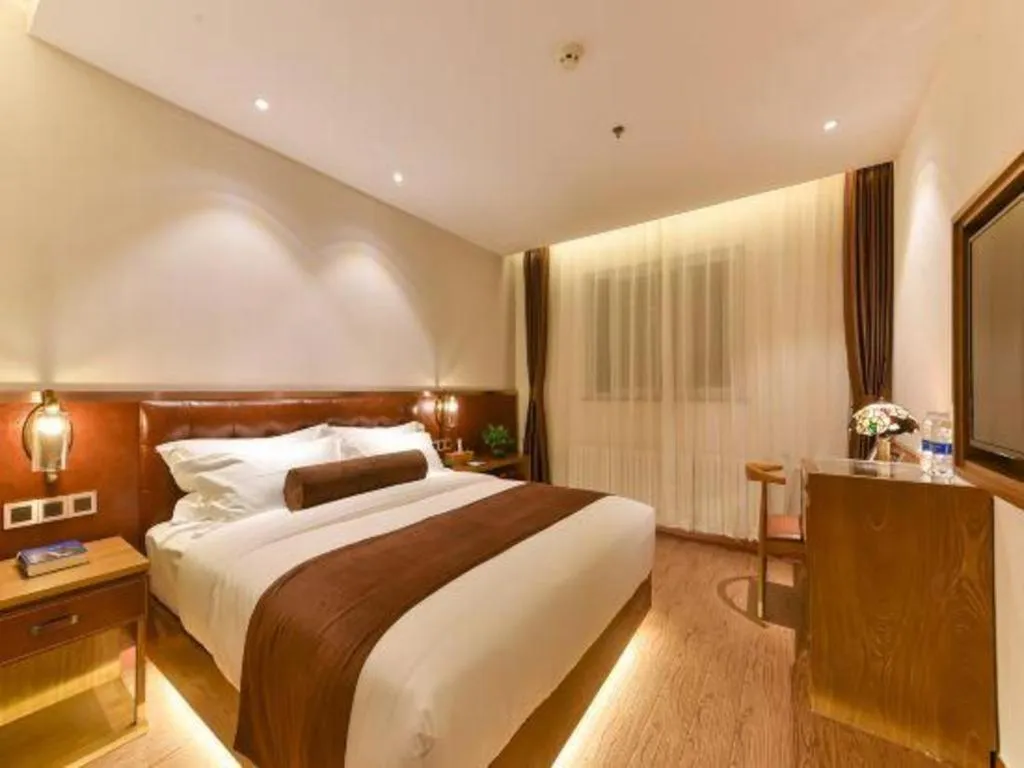 Bed in James Joyce Coffetel Shijiazhuang the Mixc Jinyuan Tower Airport Bus