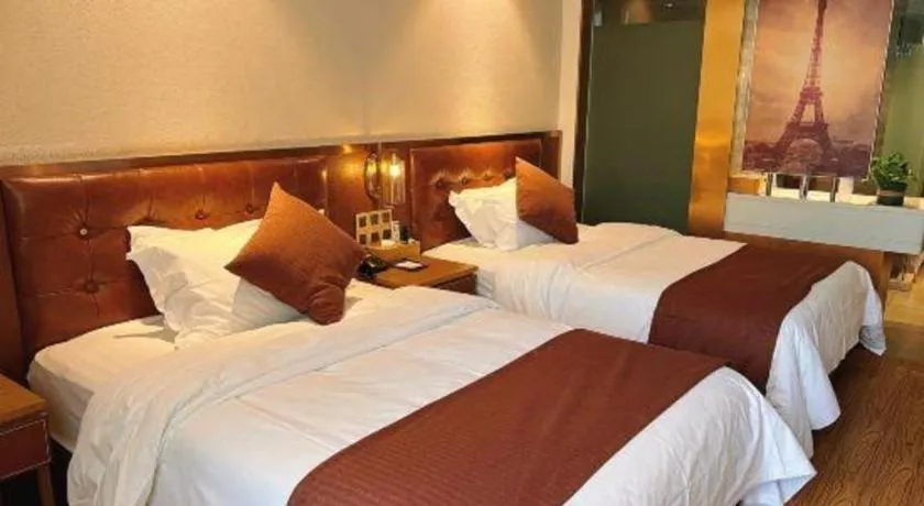 Bed in James Joyce Coffetel Shijiazhuang the Mixc Jinyuan Tower Airport Bus