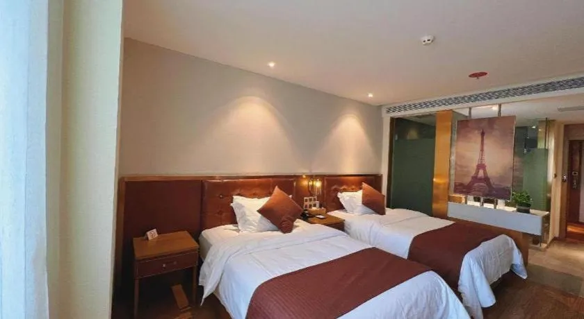 Bed in James Joyce Coffetel Shijiazhuang the Mixc Jinyuan Tower Airport Bus