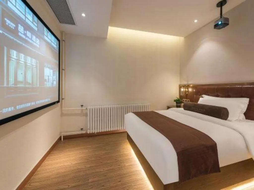 Bed in James Joyce Coffetel Shijiazhuang the Mixc Jinyuan Tower Airport Bus