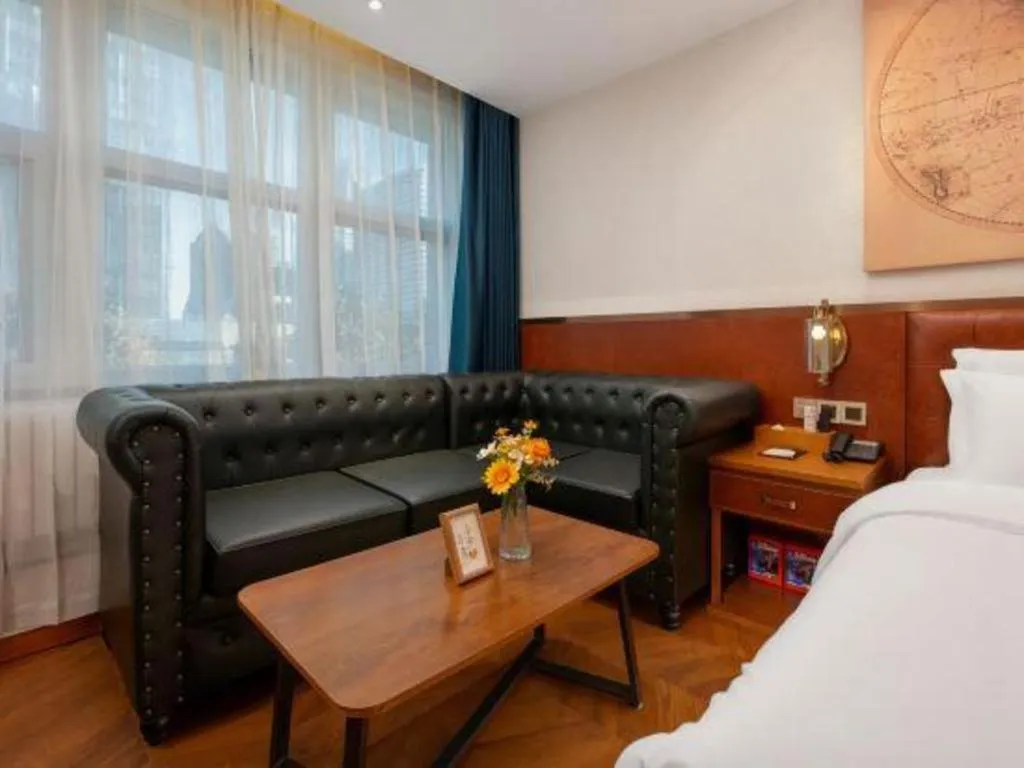Bed in James Joyce Coffetel Shijiazhuang the Mixc Jinyuan Tower Airport Bus