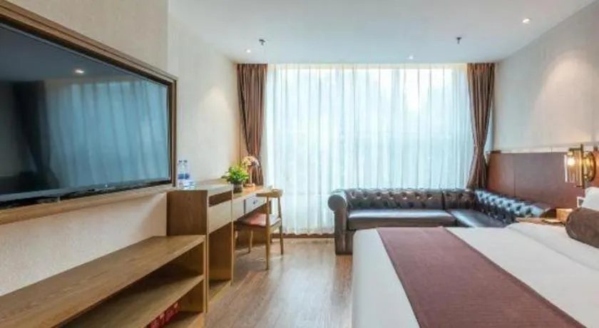 Bed in James Joyce Coffetel Shijiazhuang the Mixc Jinyuan Tower Airport Bus