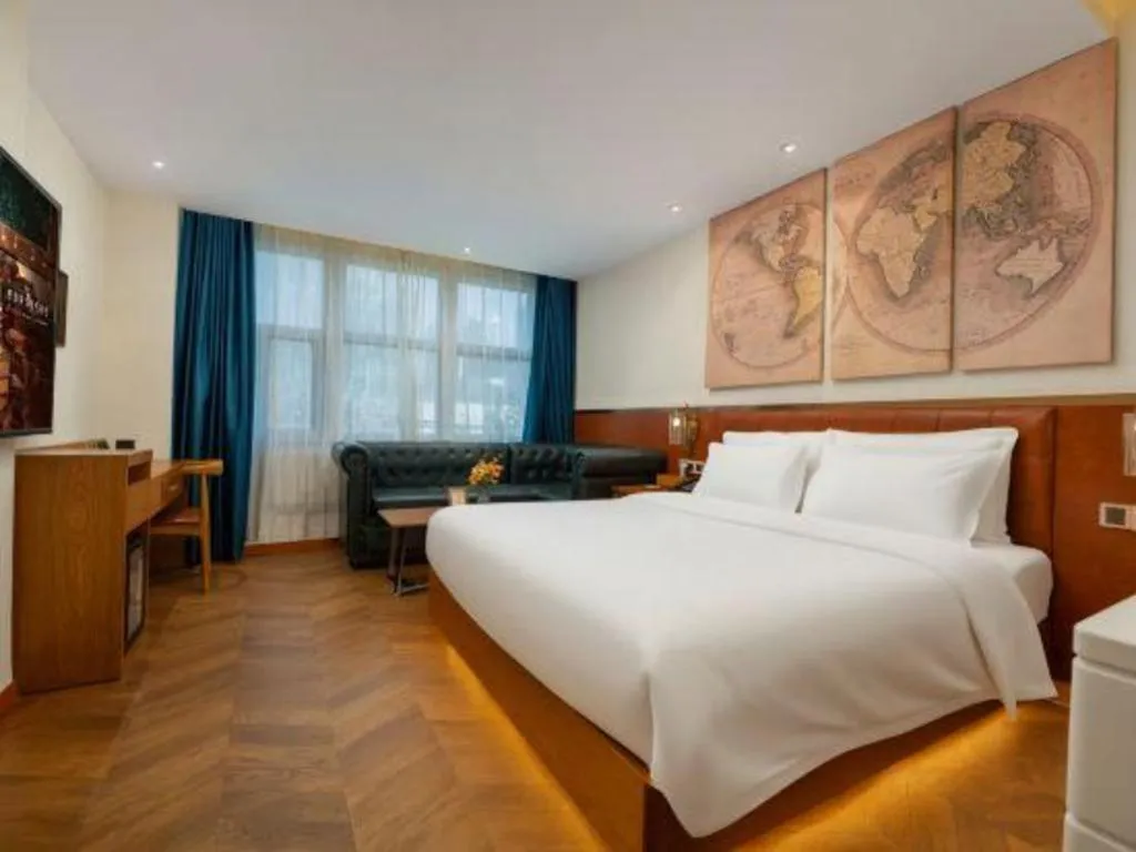 Bed in James Joyce Coffetel Shijiazhuang the Mixc Jinyuan Tower Airport Bus