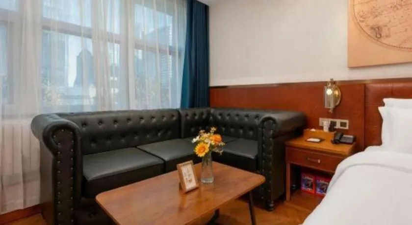 Bed in James Joyce Coffetel Shijiazhuang the Mixc Jinyuan Tower Airport Bus