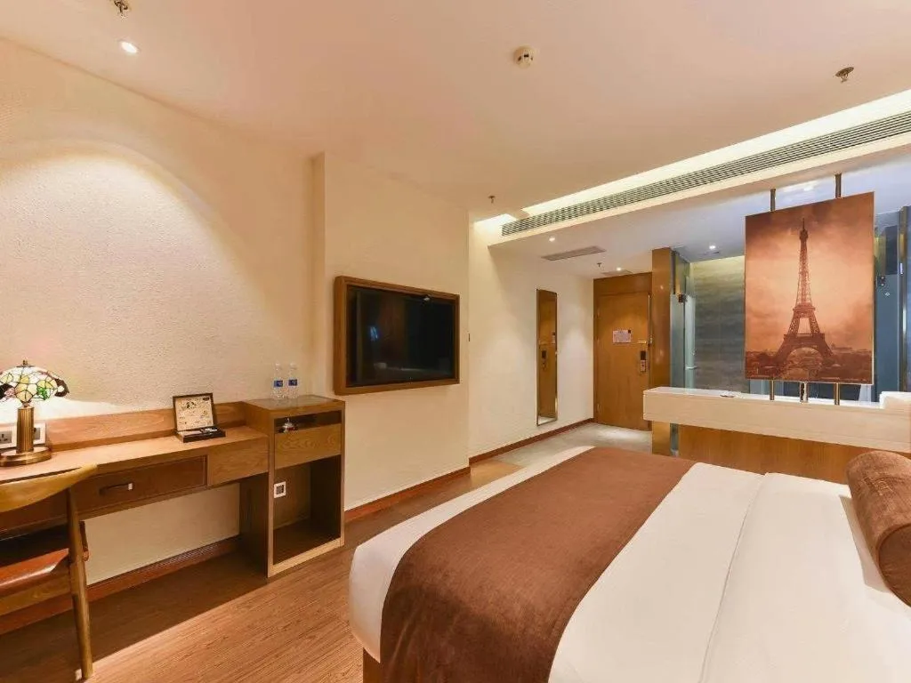Bed in James Joyce Coffetel Shijiazhuang the Mixc Jinyuan Tower Airport Bus