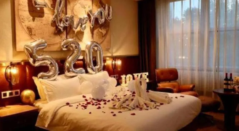 Bed in James Joyce Coffetel Shijiazhuang the Mixc Jinyuan Tower Airport Bus