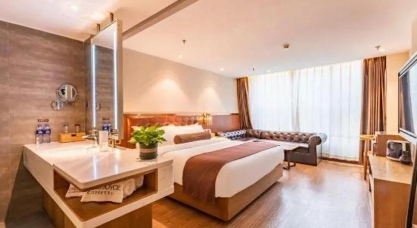 Bed in James Joyce Coffetel Shijiazhuang the Mixc Jinyuan Tower Airport Bus