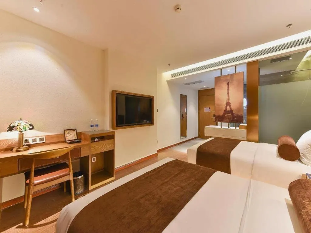 Bed in James Joyce Coffetel Shijiazhuang the Mixc Jinyuan Tower Airport Bus