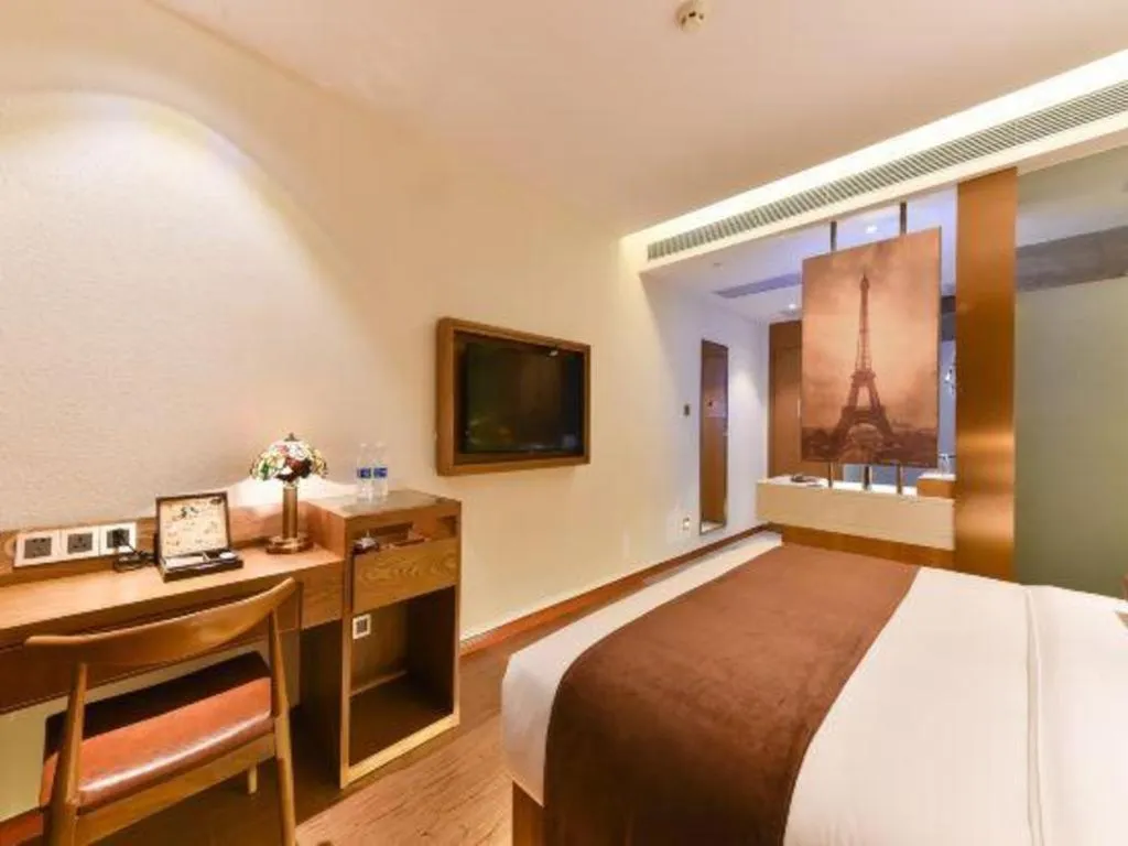 Bed in James Joyce Coffetel Shijiazhuang the Mixc Jinyuan Tower Airport Bus
