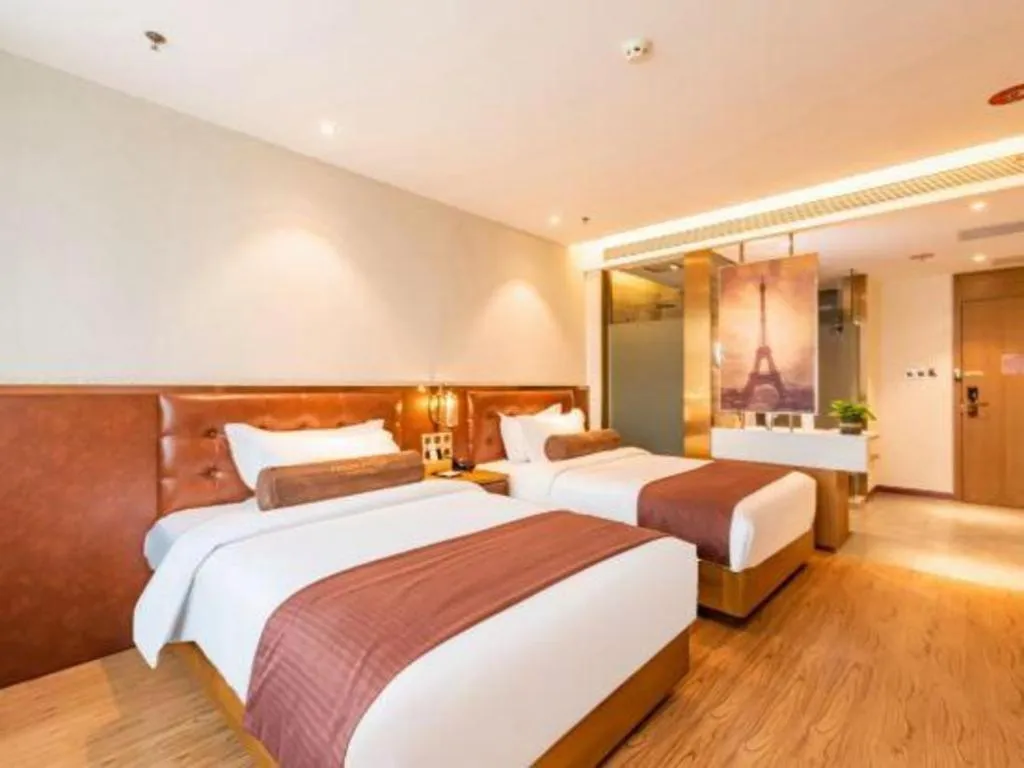 Bed in James Joyce Coffetel Shijiazhuang the Mixc Jinyuan Tower Airport Bus