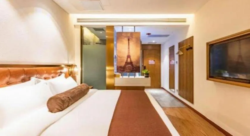 Bed in James Joyce Coffetel Shijiazhuang the Mixc Jinyuan Tower Airport Bus