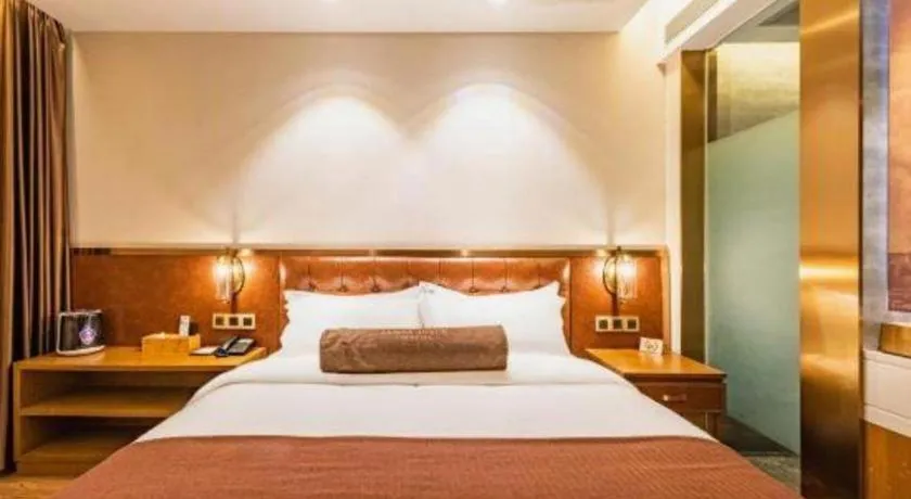 Bed in James Joyce Coffetel Shijiazhuang the Mixc Jinyuan Tower Airport Bus
