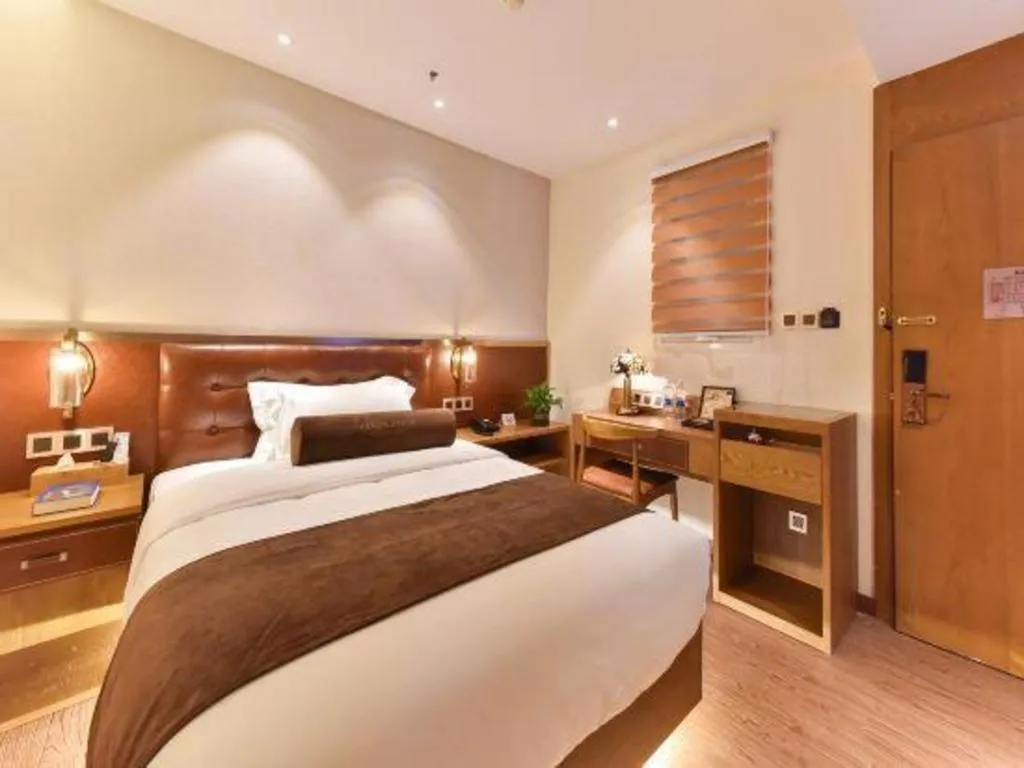 Bed in James Joyce Coffetel Shijiazhuang the Mixc Jinyuan Tower Airport Bus