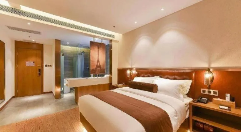 Bed in James Joyce Coffetel Shijiazhuang the Mixc Jinyuan Tower Airport Bus