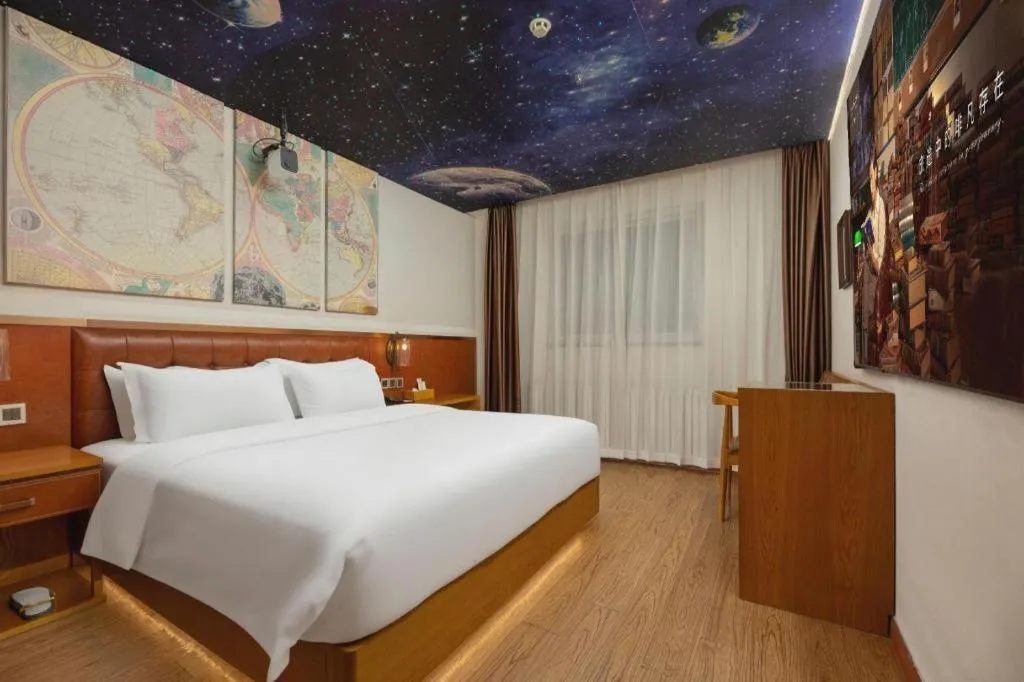 Bed in James Joyce Coffetel Shijiazhuang the Mixc Jinyuan Tower Airport Bus