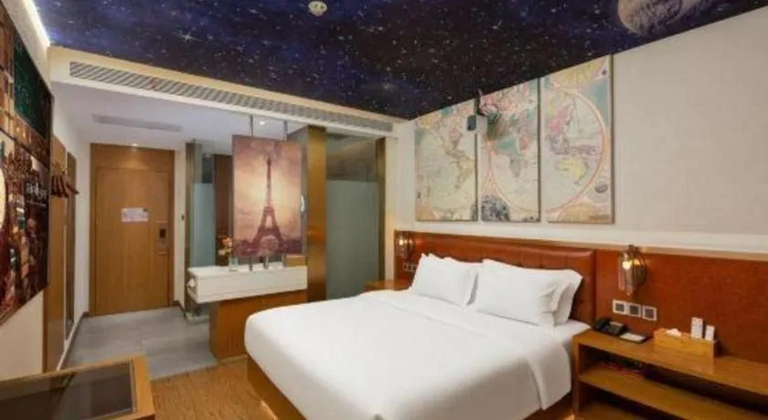 Bed in James Joyce Coffetel Shijiazhuang the Mixc Jinyuan Tower Airport Bus