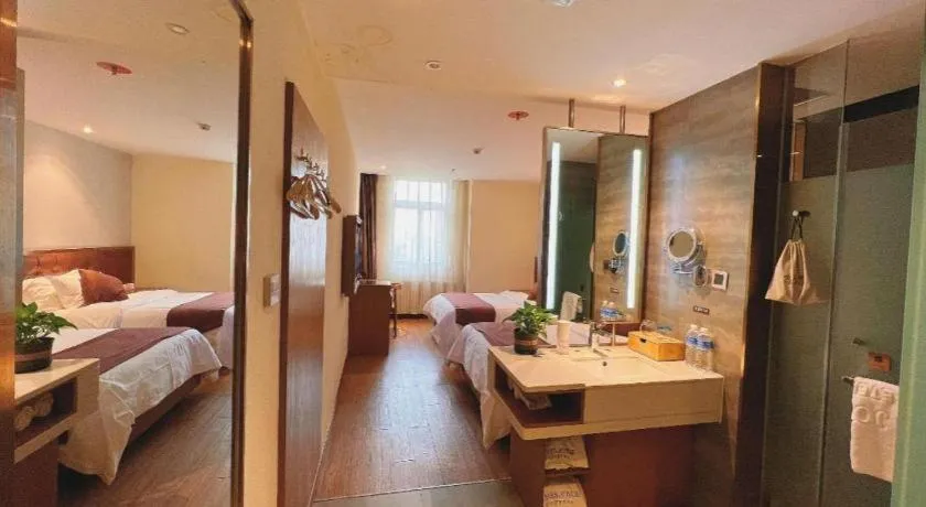 Bed in James Joyce Coffetel Shijiazhuang the Mixc Jinyuan Tower Airport Bus