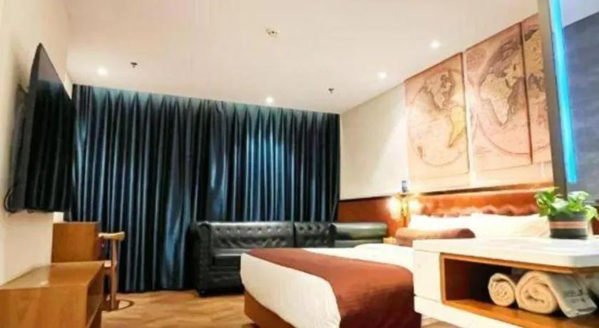 Bed in James Joyce Coffetel Shijiazhuang the Mixc Jinyuan Tower Airport Bus