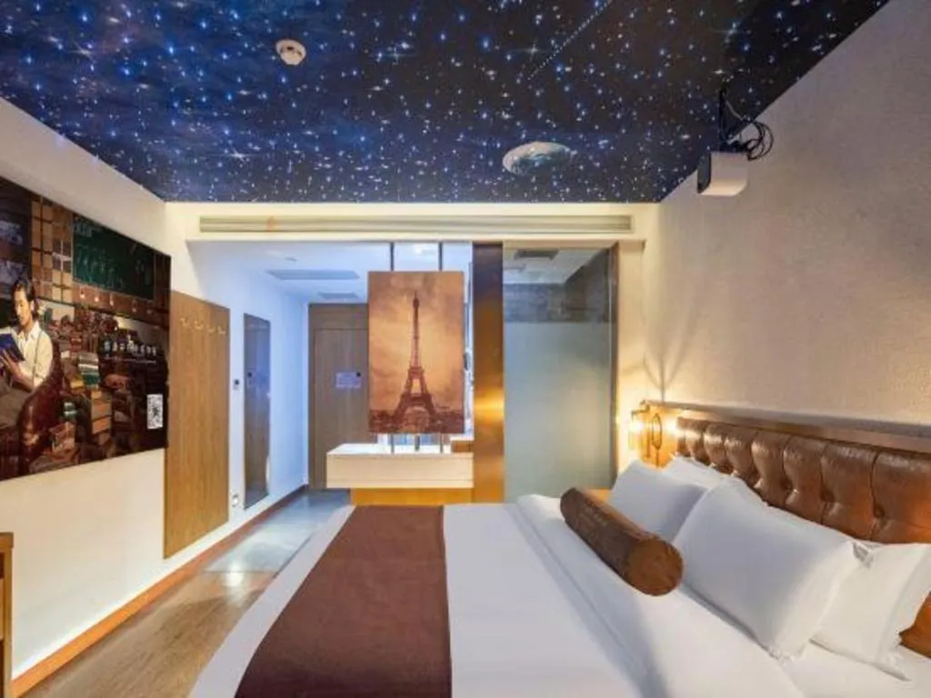 Bed in James Joyce Coffetel Shijiazhuang the Mixc Jinyuan Tower Airport Bus