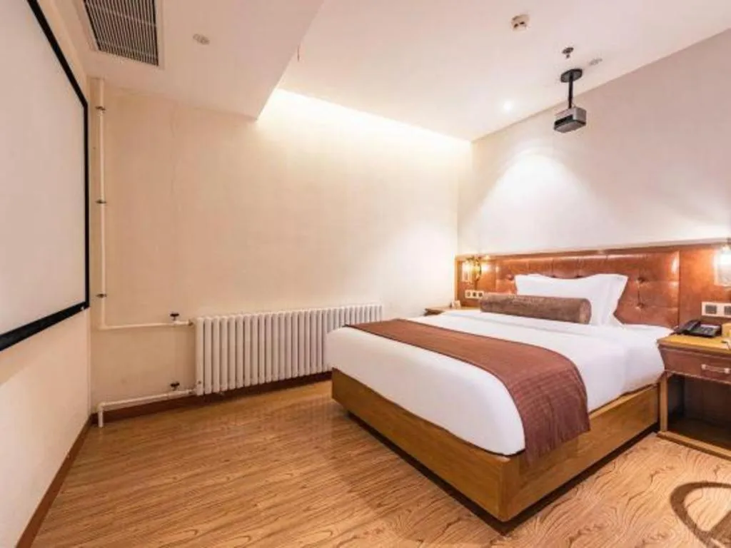 Bed in James Joyce Coffetel Shijiazhuang the Mixc Jinyuan Tower Airport Bus