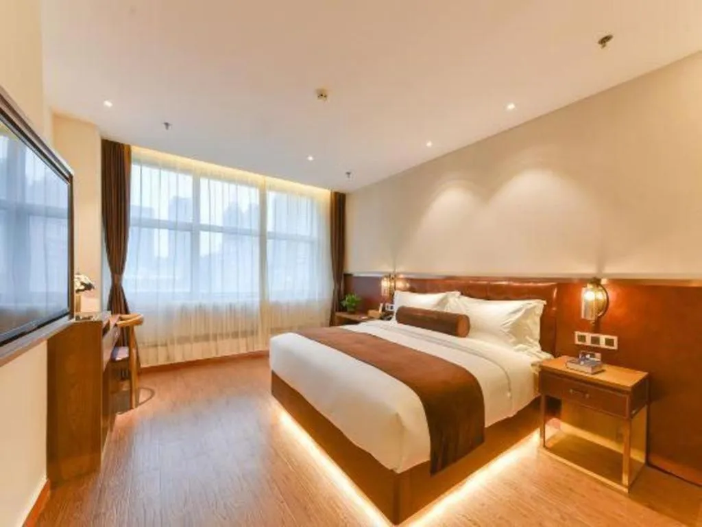 Bed in James Joyce Coffetel Shijiazhuang the Mixc Jinyuan Tower Airport Bus