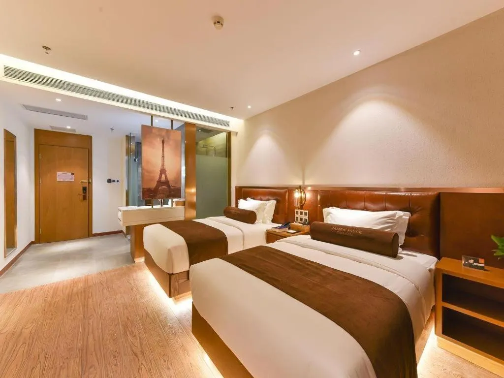 Bed in James Joyce Coffetel Shijiazhuang the Mixc Jinyuan Tower Airport Bus