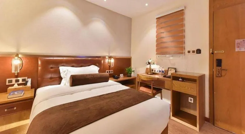 Bed in James Joyce Coffetel Shijiazhuang the Mixc Jinyuan Tower Airport Bus